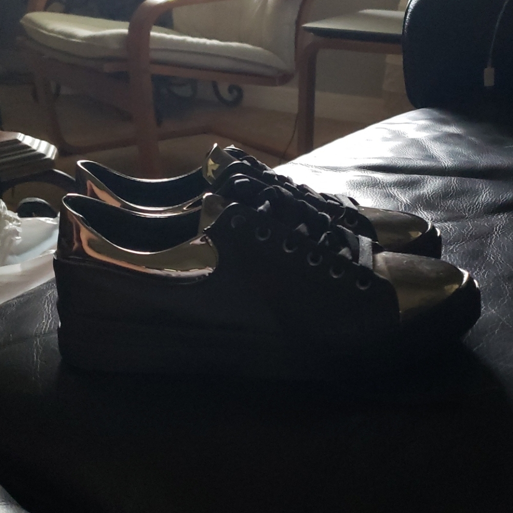 Black and silver tipped sneakers
